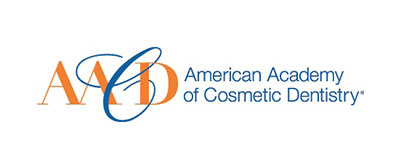 American academy of cosmetic dentistry logo